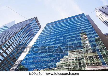 Low angled view of office skyscrapers in financial district, Manhattan, New York, USA View Large Photo Image Stock Image - Low angled view of office skyscrapers in financial district, Manhattan, New York, USA. Fotosearch