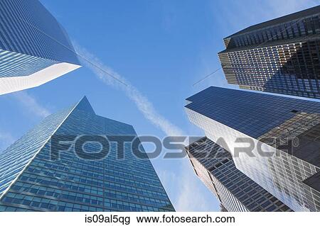 Low angled view of skyscrapers in financial district, Manhattan, New York, USA View Large Photo Image Stock Image - Low angled view of skyscrapers in financial district, Manhattan, New York, USA. Fotosearch