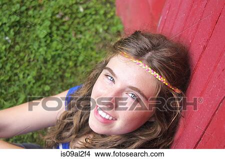 Picture - Portrait of a teenage girl, elevated view. Fotosearch