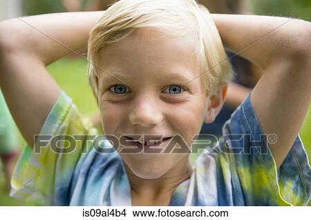 Picture - Portrait of boy in garden. Fotosearch