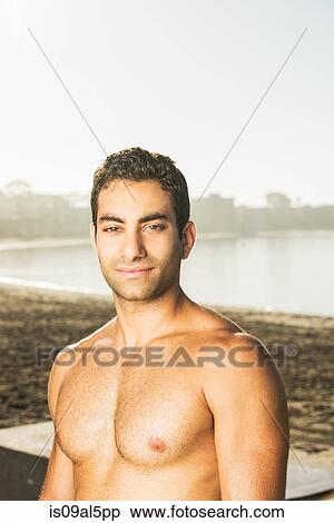 Portrait of handsome young man on Pacific beach, San Diego, California, USA View Large Photo Image Stock Photography - Portrait of handsome young man on Pacific beach, San Diego, California, USA. Fotosearch