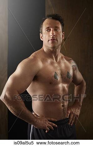 Portrait of muscular mid adult male crossfitter in gym View Large Photo Image Stock Photography - Portrait of muscular mid adult male crossfitter in gym. Fotosearch