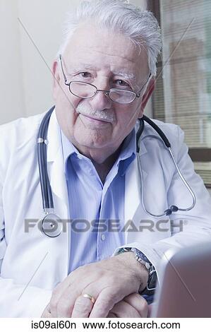 Portrait of senior doctor View Large Photo Image Picture - Portrait of senior doctor. Fotosearch