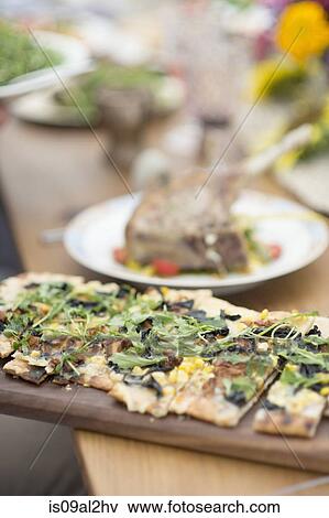 Prepared food on table, ready for serving View Large Photo Image Stock Photo - Prepared food on table, ready for serving. Fotosearch