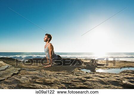 Upward dog yoga pose, Windansea beach, La Jolla, California View Large Photo Image Stock Image - Upward dog yoga pose, Windansea beach, La Jolla, California. Fotosearch