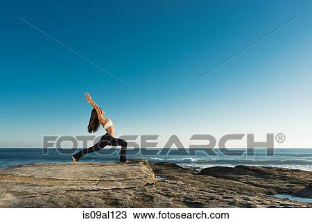 Warrior pose, Windansea beach, La Jolla, California View Large Photo Image Stock Image - Warrior pose, Windansea beach, La Jolla, California. Fotosearch