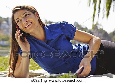 Stock Image - Woman using smartphone. Fotosearch
