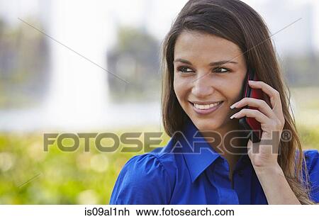 Woman using smartphone View Large Photo Image Stock Image - Woman using smartphone. Fotosearch