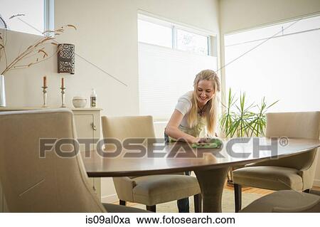 Young woman cleaning surfaces with green cleaning products View Large Photo Image Stock Image - Young woman cleaning surfaces with green cleaning products. Fotosearch