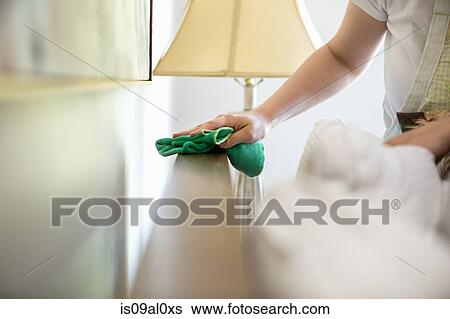 Young woman cleaning surfaces with green cleaning products View Large Photo Image Stock Photograph - Young woman cleaning surfaces with green cleaning products. Fotosearch