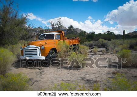 Abandoned orange pickup truck, Onyx, California, USA View Large Photo Image Stock Image - Abandoned orange pickup truck, Onyx, California, USA. Fotosearch