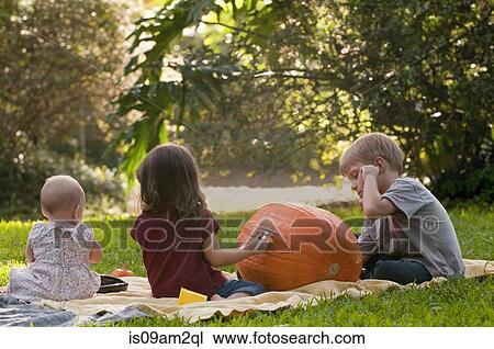 Children drawing on pumpkin View Large Photo Image Stock Image - Children drawing on pumpkin. Fotosearch