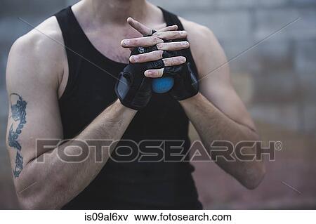 Cropped shot of young male handball player squeezing ball View Large Photo Image Stock Photo - Cropped shot of young male handball player squeezing ball. Fotosearch