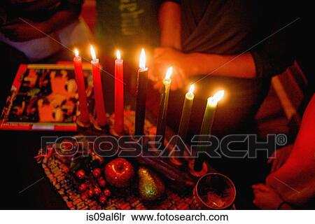 Family celebrating Kwanzaa, elevated view View Large Photo Image Stock Photography - Family celebrating Kwanzaa, elevated view. Fotosearch