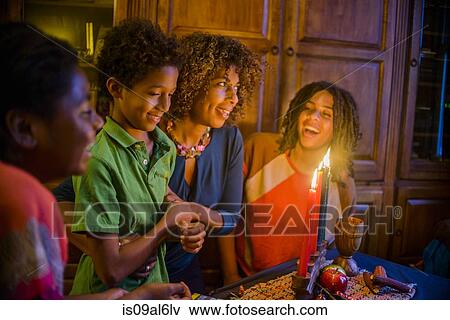Family celebrating Kwanzaa View Large Photo Image Stock Photo - Family celebrating Kwanzaa. Fotosearch