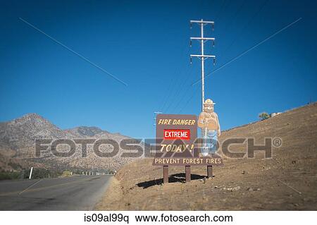 Fire warning sign on highway, Kerville, California, USA View Large Photo Image Stock Photography - Fire warning sign on highway, Kerville, California, USA. Fotosearch