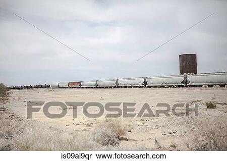 Freight train in desert landscape, California, USA View Large Photo Image Stock Photography - Freight train in desert landscape, California, USA. Fotosearch