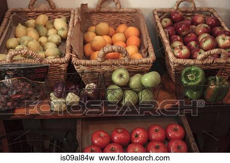 Fruit and vegetable baskets in country store View Large Photo Image Stock Photo - Fruit and vegetable baskets in country store. Fotosearch