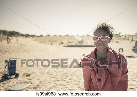 Girl wrapped in towel on beach, Truro, Massachusetts, Cape Cod, USA View Large Photo Image Stock Photo - Girl wrapped in towel on beach, Truro, Massachusetts, Cape Cod, USA. Fotosearch