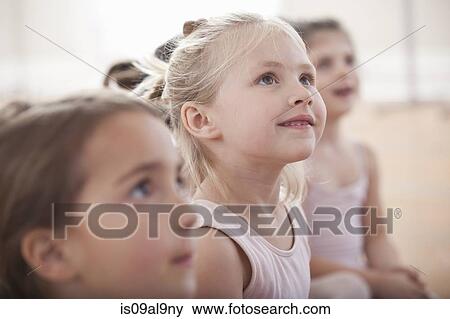 Group of girls looking up in ballet school View Large Photo Image Stock Photo - Group of girls looking up in ballet school. Fotosearch