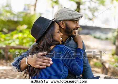 Happy couple hugging View Large Photo Image Stock Photo - Happy couple hugging. Fotosearch