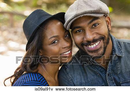 Stock Photo - Happy couple smiling. Fotosearch