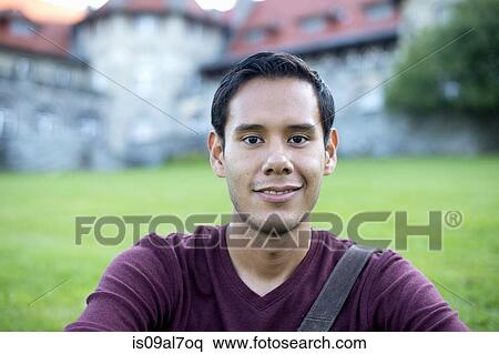Head and shoulders portrait of a young man View Large Photo Image Stock Photography - Head and shoulders portrait of a young man. Fotosearch
