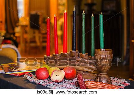 Stock Image - Kinara candles for Kwanzaa celebration. Fotosearch