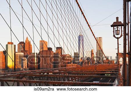 Manhattan skyline from Brooklyn Bridge, New York, USA View Large Photo Image Stock Image - Manhattan skyline from Brooklyn Bridge, New York, USA. Fotosearch