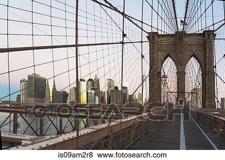 Manhattan skyline from Brooklyn Bridge, New York, USA View Large Photo Image Stock Photo - Manhattan skyline from Brooklyn Bridge, New York, USA. Fotosearch