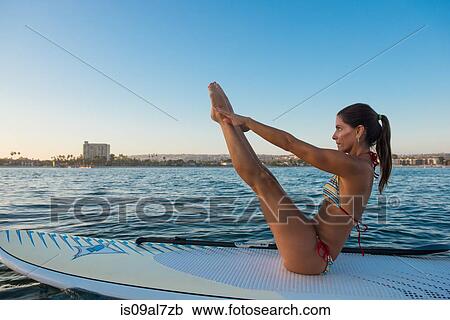 Mature woman in yoga position on paddleboard, Mission Bay, San Diego, California, USA View Large Photo Image Stock Image - Mature woman in yoga position on paddleboard, Mission Bay, San Diego, California, USA. Fotosearch