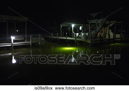 Pier at night, Poquito Bayou, Emerald Coast, Shalimar, Florida, USA View Large Photo Image Stock Photo - Pier at night, Poquito Bayou, Emerald Coast, Shalimar, Florida, USA. Fotosearch