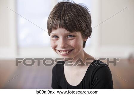 Stock Photo - Portrait of smiling girl in ballet school. Fotosearch