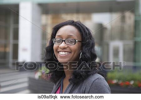 Portrait of smiling woman, Detroit, Michigan, USA View Large Photo Image Stock Image - Portrait of smiling woman, Detroit, Michigan, USA. Fotosearch
