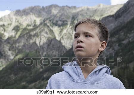 Portrait of teenage boy looking sideways, South Dakota, USA View Large Photo Image Stock Image - Portrait of teenage boy looking sideways, South Dakota, USA. Fotosearch