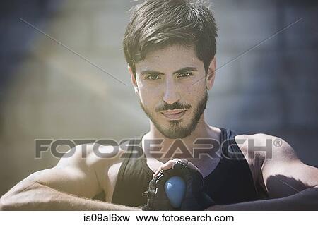 Portrait of young male handball player holding ball View Large Photo Image Stock Photo - Portrait of young male handball player holding ball. Fotosearch
