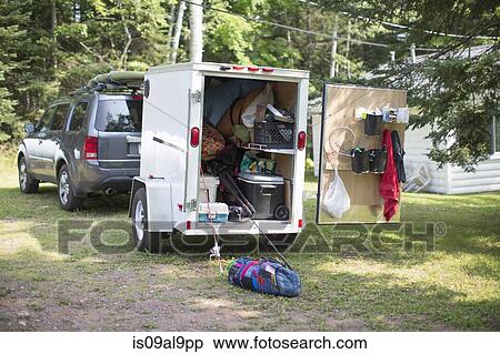 Recreational vehicle and trailer at campsite, Lake Superior, Gwinn, Michigan, USA View Large Photo Image Stock Photography - Recreational vehicle and trailer at campsite, Lake Superior, Gwinn, Michigan, USA. Fotosearch