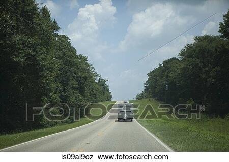 Recreational vehicle on highway, Santa Rosa, Florida, USA View Large Photo Image Stock Photo - Recreational vehicle on highway, Santa Rosa, Florida, USA. Fotosearch