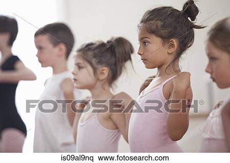 Row of children practicing in ballet school View Large Photo Image Stock Photography - Row of children practicing in ballet school. Fotosearch