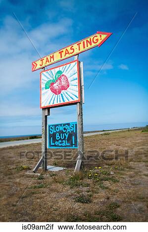 Stock Image - Strawberry jam advertisement on roadside, Big Sur, Davenport, California, USA. Fotosearch