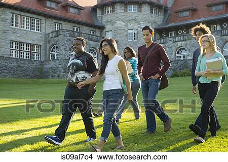 Students walking across grass View Large Photo Image Picture - Students walking across grass. Fotosearch