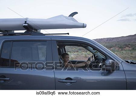 Teenage boy in driver seat of recreational vehicle, Arches National Park, Moab, Utah, USA View Large Photo Image Stock Photograph - Teenage boy in driver seat of recreational vehicle, Arches National Park, Moab, Utah, USA. Fotosearch