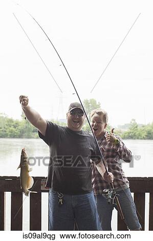 Two fishermen with catfish, river Raisin, Monroe, Michigan, USA View Large Photo Image Stock Image - Two fishermen with catfish, river Raisin, Monroe, Michigan, USA. Fotosearch