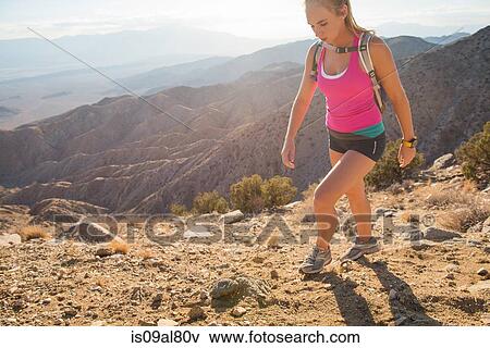 Woman hiking, Joshua Tree National Park, California, US View Large Photo Image Stock Photo - Woman hiking, Joshua Tree National Park, California, US. Fotosearch