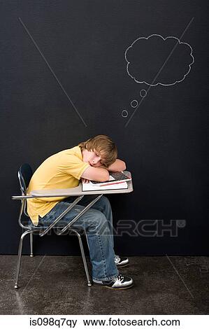 Stock Photo - A boy sleeping. Fotosearch