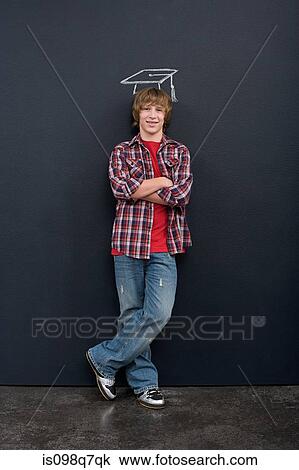 Stock Image - A boy with a chalk mortar board. Fotosearch