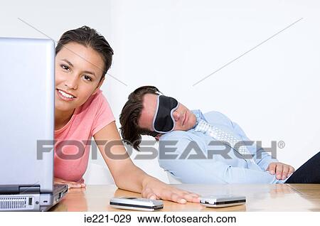 A businessman sleeping View Large Photo Image Stock Photo - A businessman sleeping. Fotosearch