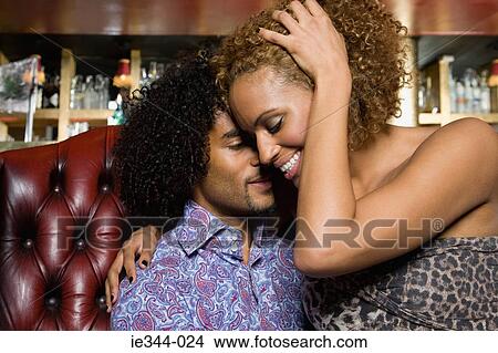 Picture - A couple flirting. Fotosearch