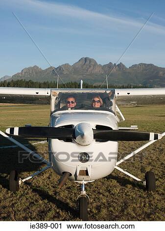 A couple in a plane View Large Photo Image Stock Image - A couple in a plane. Fotosearch
