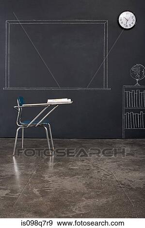 Stock Photo - A desk in a classroom. Fotosearch